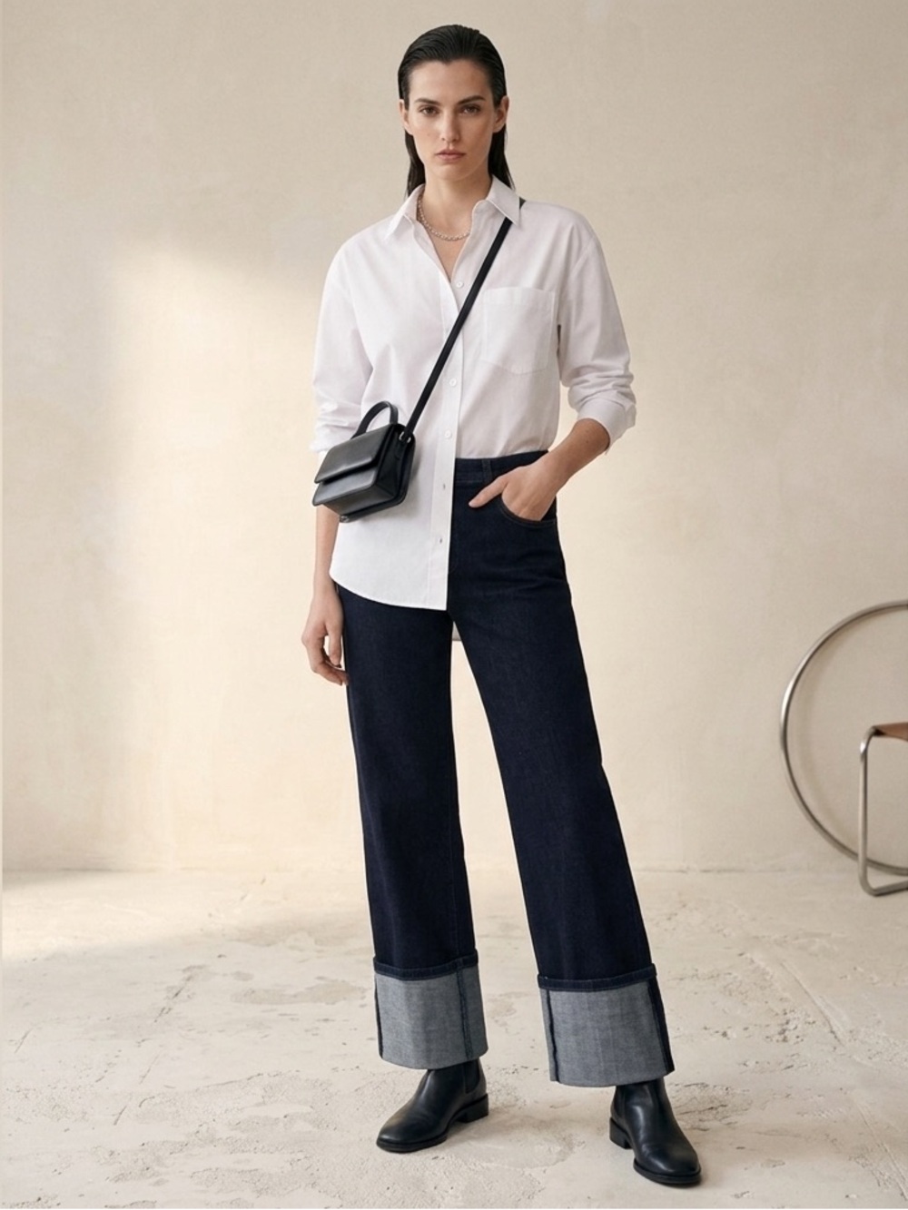 Kut from the Kloth high-rise jeans with wide legs and a thick cuffed hem.